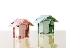 Euro banknotes are combined in small houses (file contains clipping path for objects)
